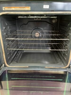Detailed look at the controls of Maytag YMER8880BS stove.